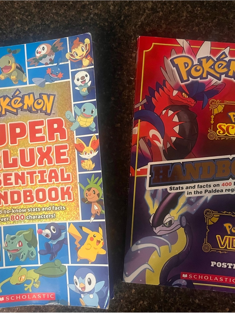 Scholastic Pokémon Super Deluxe Essential Handbook - Blue & Red Covers